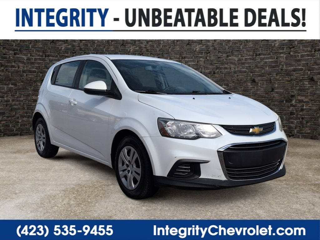 2018 Chevrolet Sonic LT in Summit White — front three-quarter view
