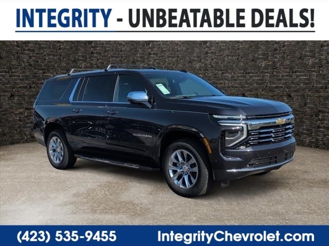 2026 Chevrolet Suburban Premier in Dark Ash Metallic — front three-quarter view