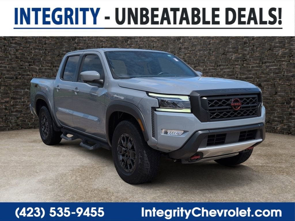 2023 Nissan Frontier Crew Cab PRO-4X 4x4 in Gray — front three-quarter view