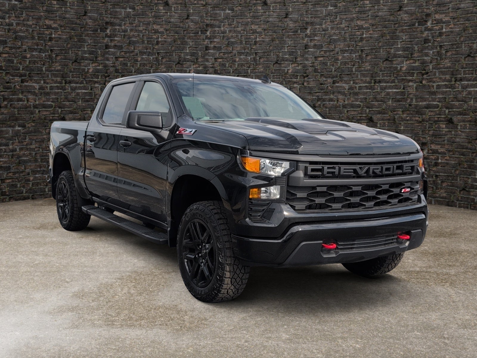 2026 Chevrolet Silverado 1500 Custom Trail Boss in Black — front three-quarter view